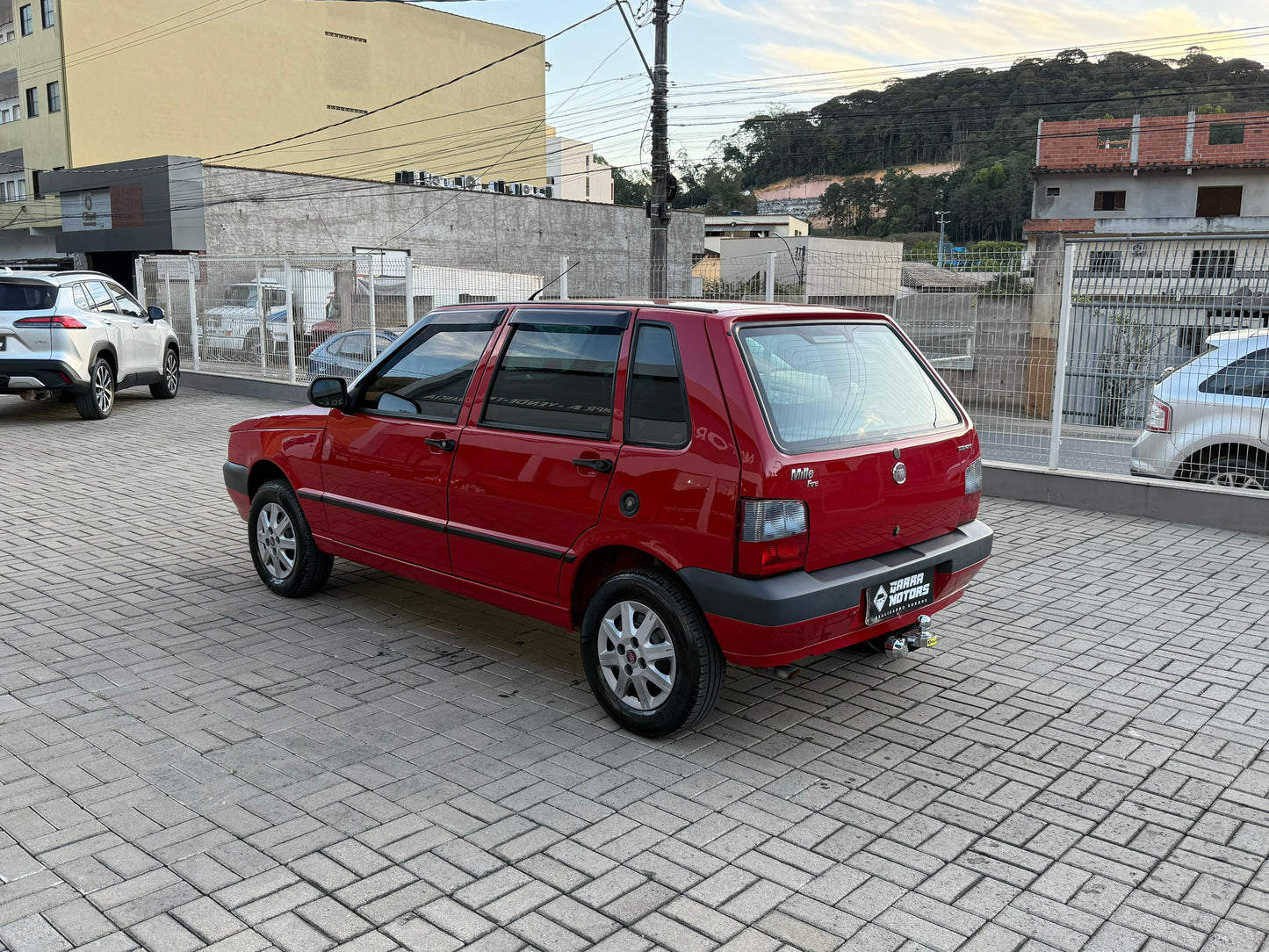 Fiat Uno Mille Fire 1.0 Flex mod 2012 Com ar condicionado